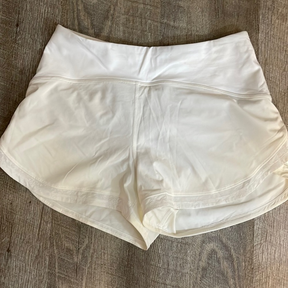 BNWOT RARE white Lululemon 4” reflective shorts